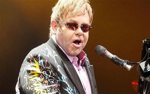 Elton John spotted with a Trunki!