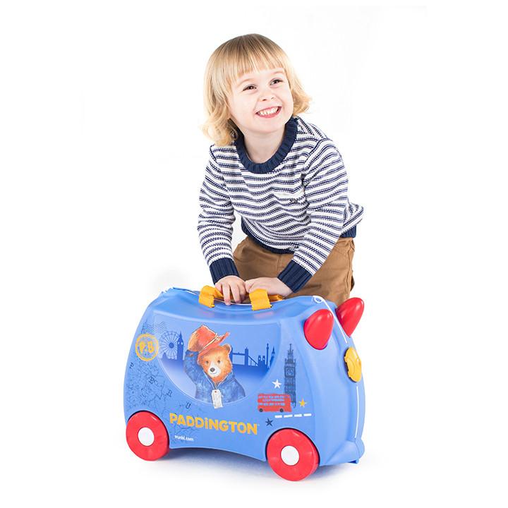 happy child with paddington bear Trunki